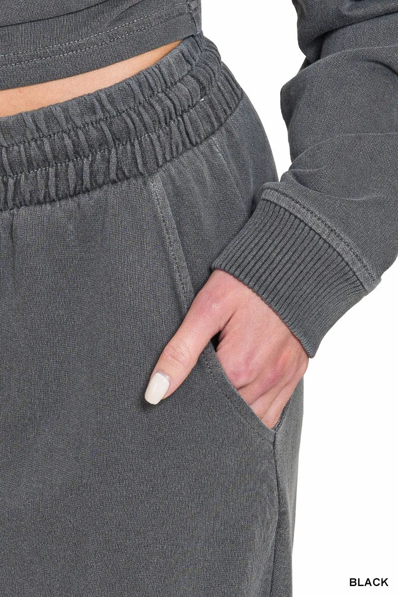 Dark gray wide-leg pants with ribbed cuffs and elastic waist
