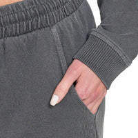 Dark gray wide-leg pants with ribbed cuffs and elastic waist