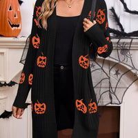 Black open-front knit cardigan with orange jack-o'-lantern and pumpkin pattern