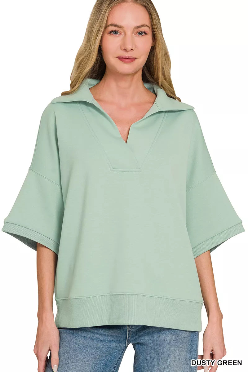 Dusty green collared short-sleeve pullover top with V-neck placket