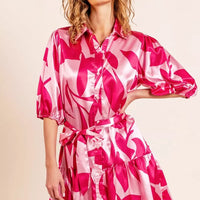 Fuchsia satin mini dress with leaf pattern, pointed collar, button front