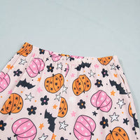 Pink pumpkin print pajama shorts with elastic waistband, front view