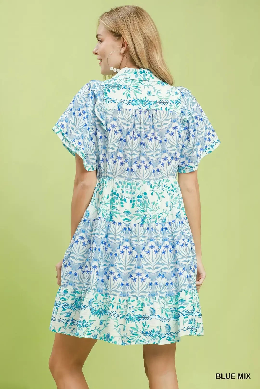 Blue floral tiered mini dress with flutter sleeves, back view