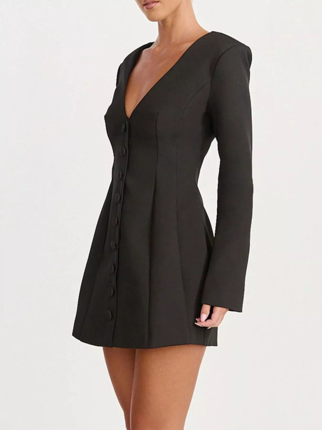 Black blazer dress with deep V-neck, long sleeves, and button front
