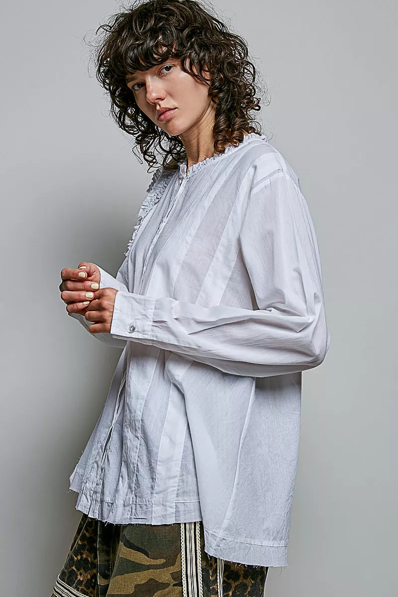 Ivory lightweight woven shirt with ruffle trim round neck, long sleeves, button placket