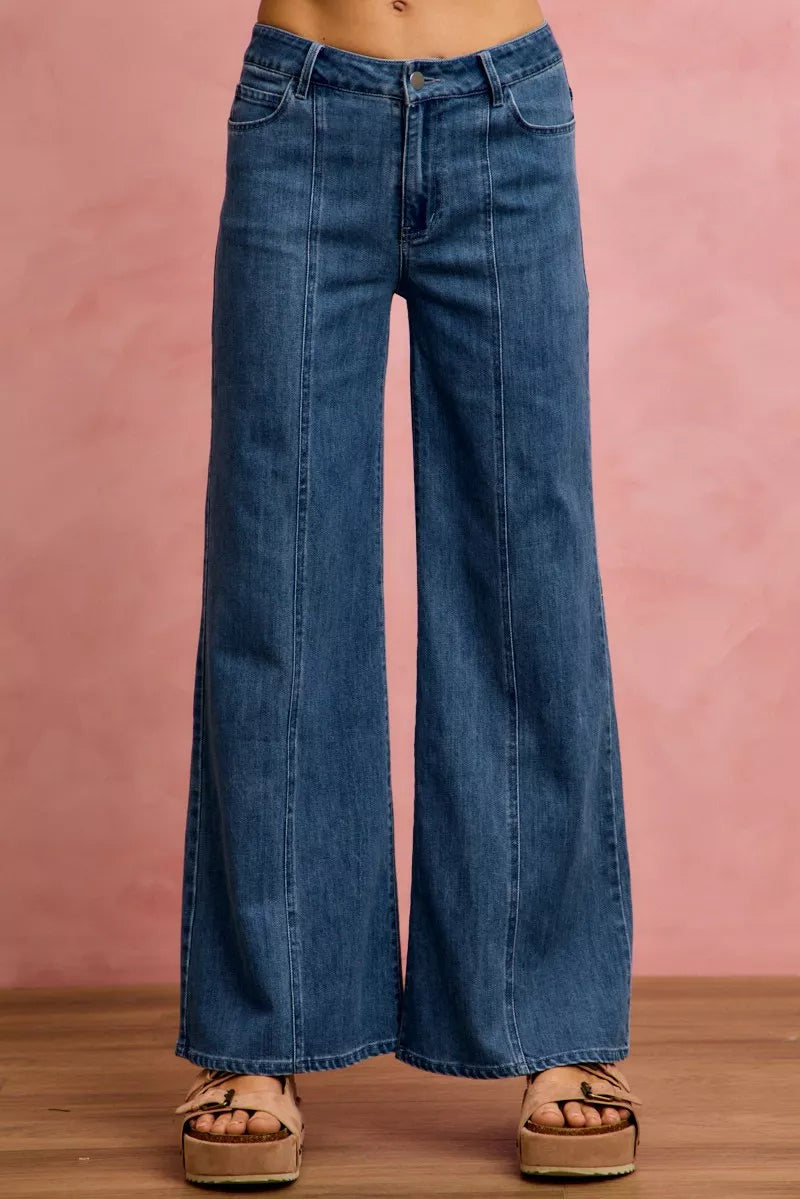 Mid-rise stretch denim jeans with center seam detail, wide flared legs