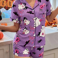 Purple Halloween lounge set with button-down short-sleeve top and matching printed shorts