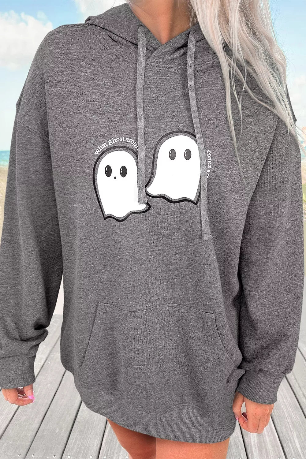 Dark gray oversize hoodie with ghost face front graphic and kangaroo pocket, drawstring hood