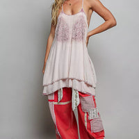 Sleeveless cotton mini dress with rose-pink embroidery and scalloped border at hem
