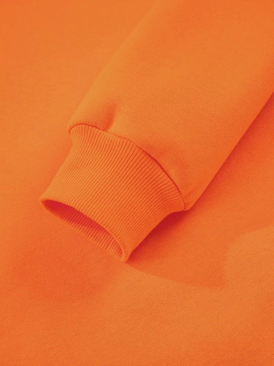 Orange crewneck sweatshirt with ribbed knit sleeve cuff