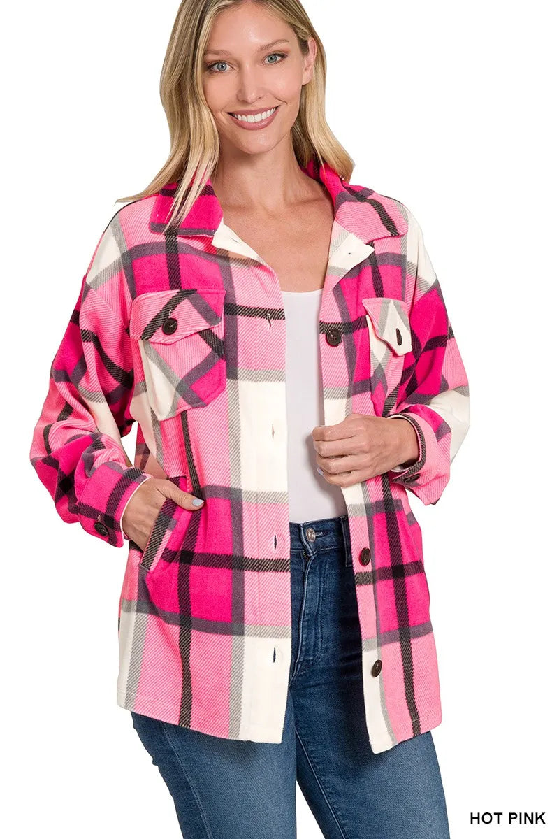 Hot pink plaid fleece shacket with snap buttons and front chest pockets
