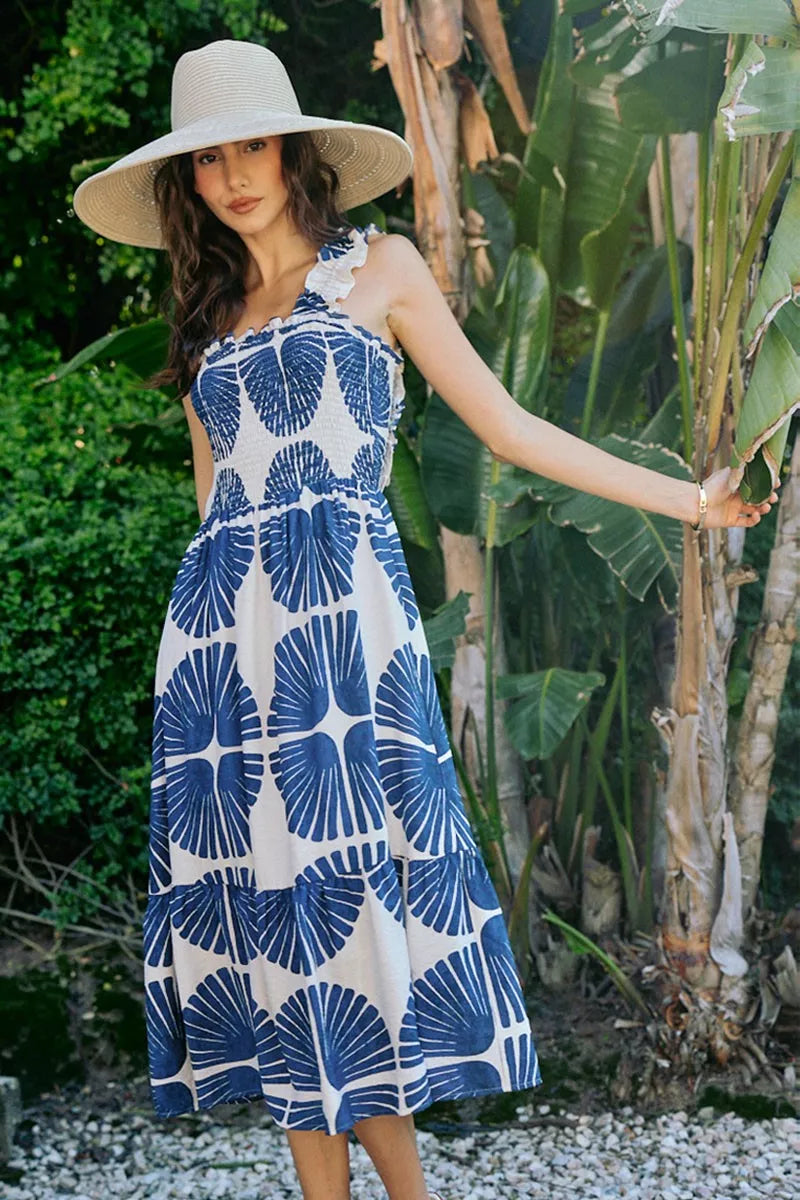 Sleeveless smocked bodice tiered midi dress with navy abstract print, lined