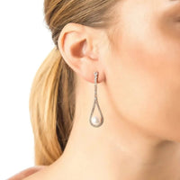 Silver pearl drop earrings with beaded top and teardrop rhinestone frame