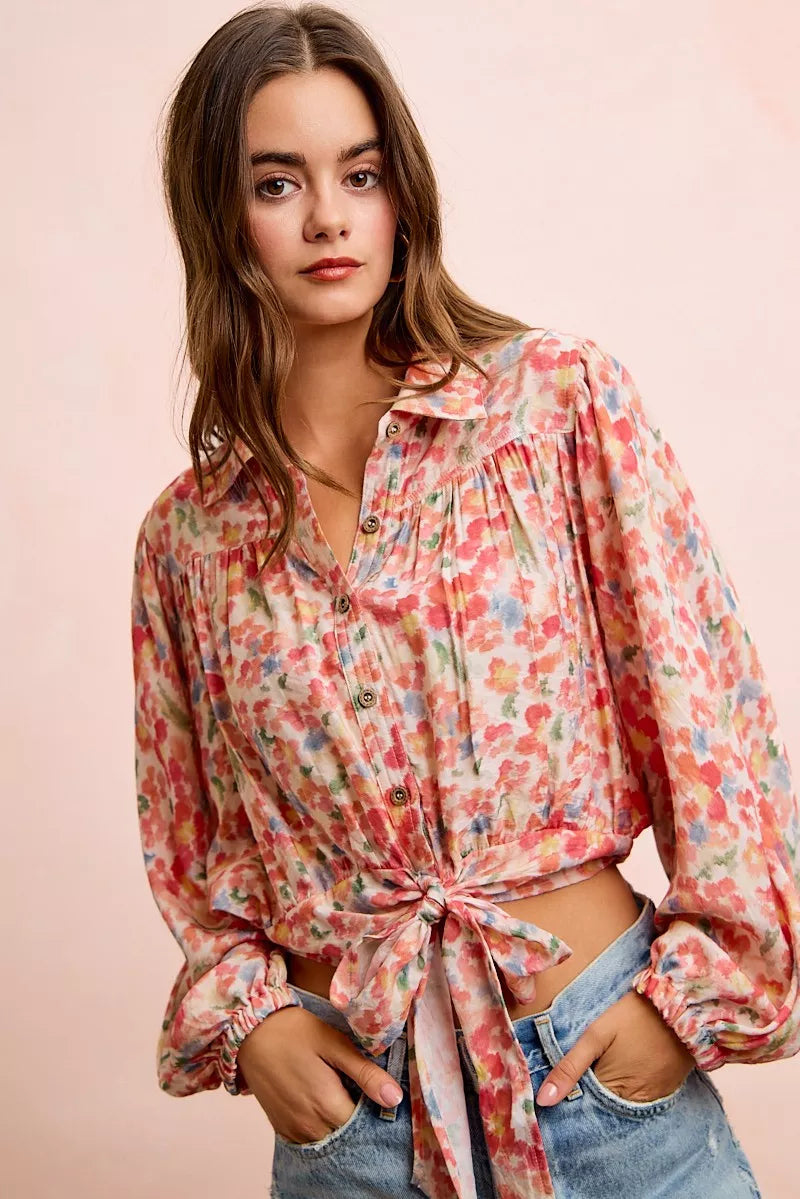 Floral print crop shirt with tie hem, V-neck, button front and long puff sleeves