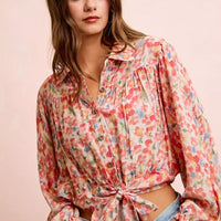 Floral print crop shirt with tie hem, V-neck, button front and long puff sleeves