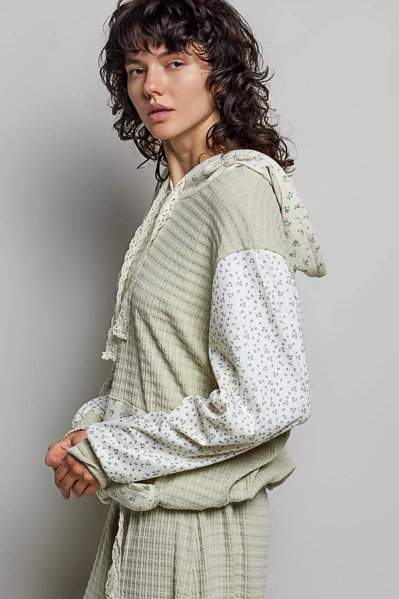 Sage mixed-knit contrast sleeve print hoodie, side view, with hood and kangaroo pocket