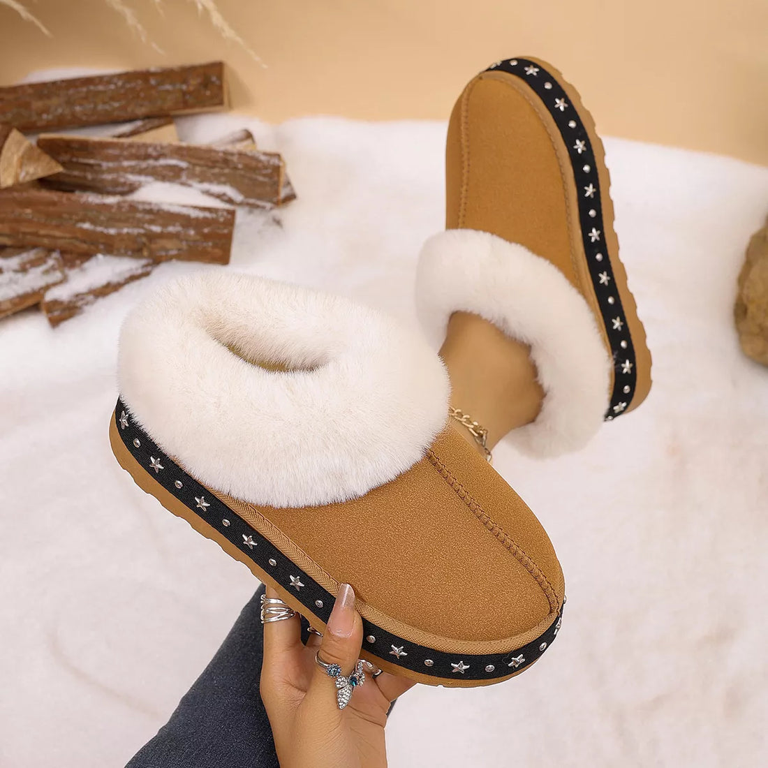 Brown faux fur lined platform ankle boots, front view with fuzzy collar and stars