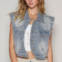 Light wash denim asymmetrical front closure vest with raw hem, button pockets