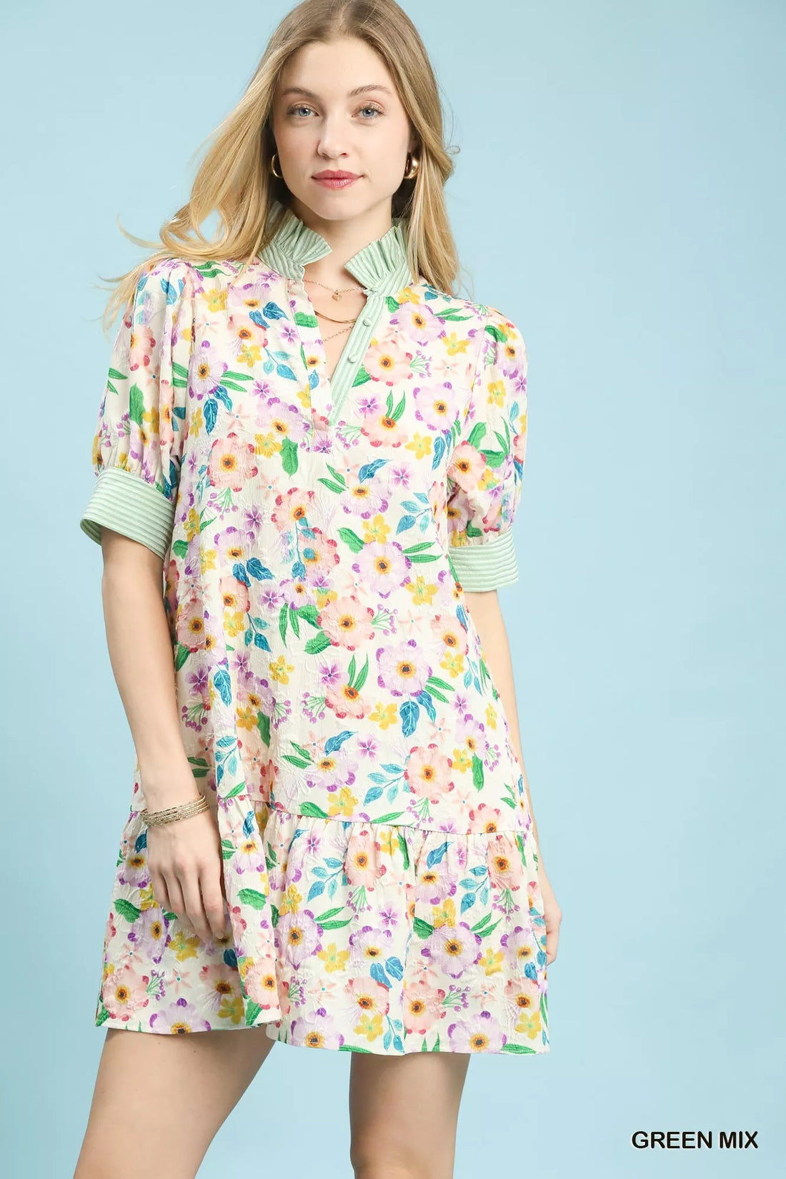 Green floral tiered babydoll dress with ruffle collar and short sleeves
