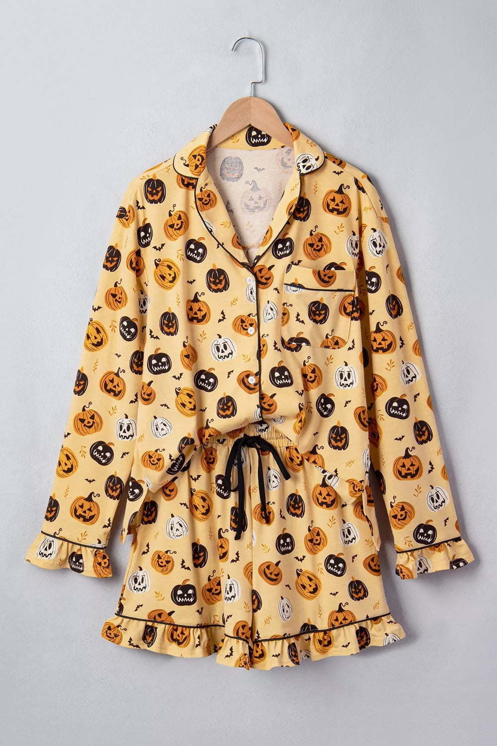 Gold Halloween-print long-sleeve pajama set, button top with matching ruffle shorts