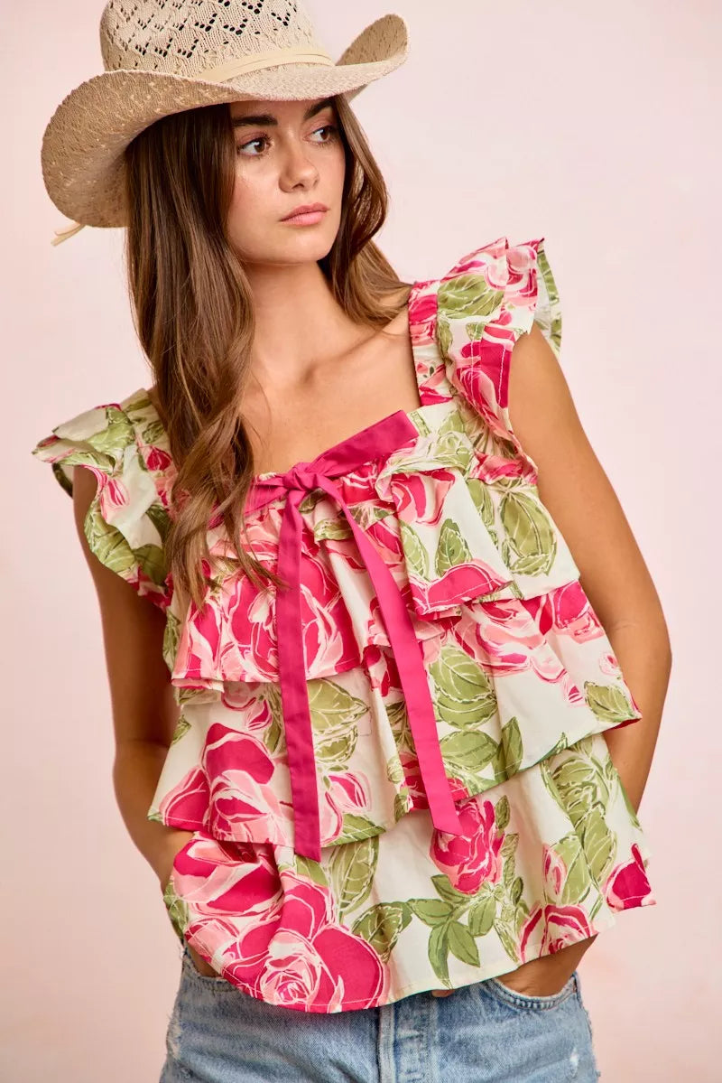 Floral ruffle square-neck top with bow tie at center, pink and green rose pattern