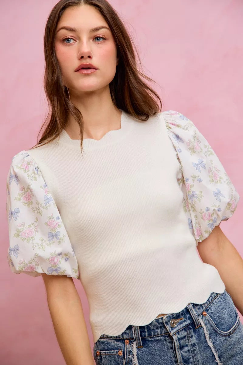 White knit sweater top with puff floral contrast sleeves and scalloped hem