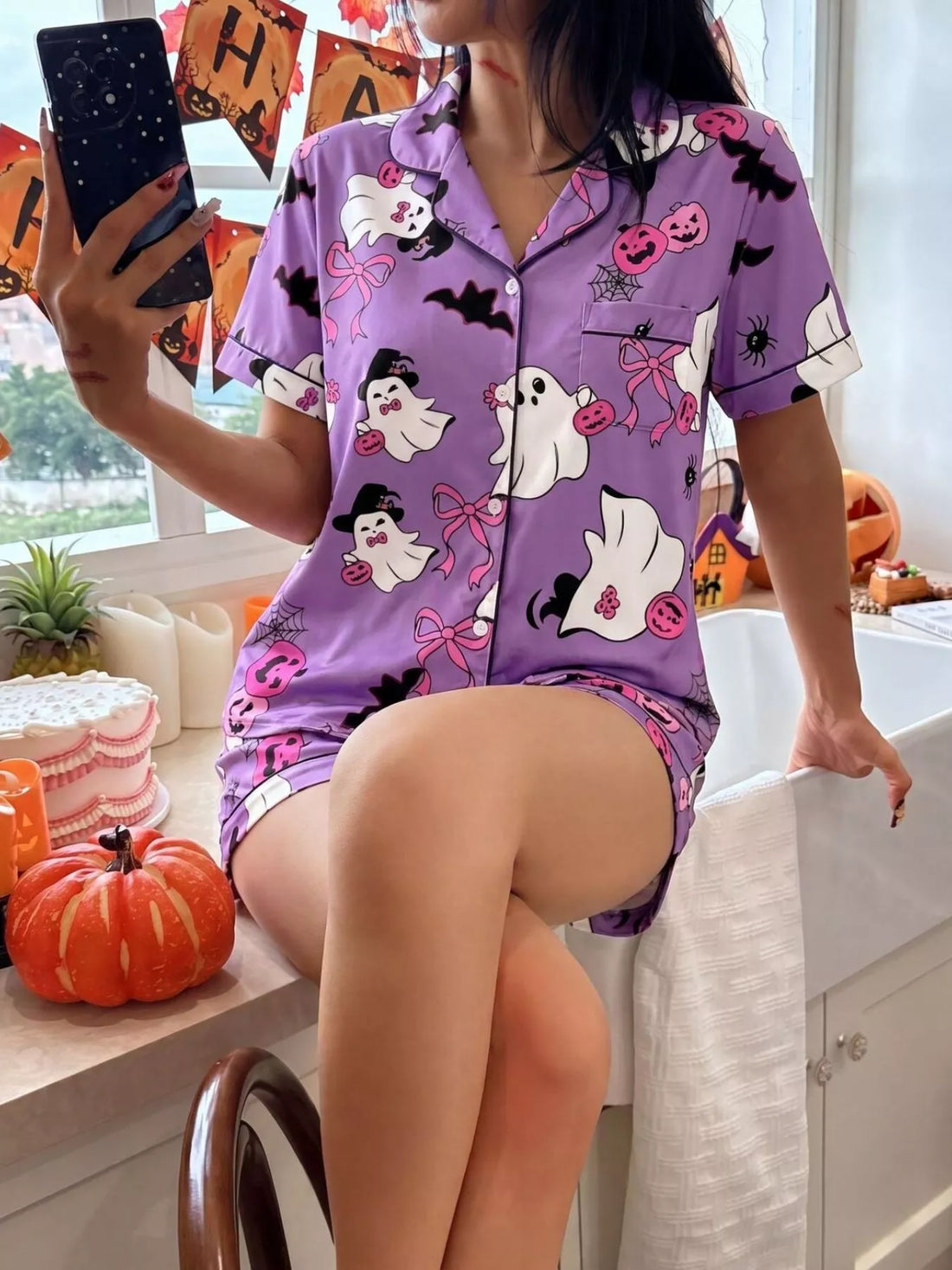 Purple Halloween lounge set with button-down top and matching shorts, ghost print