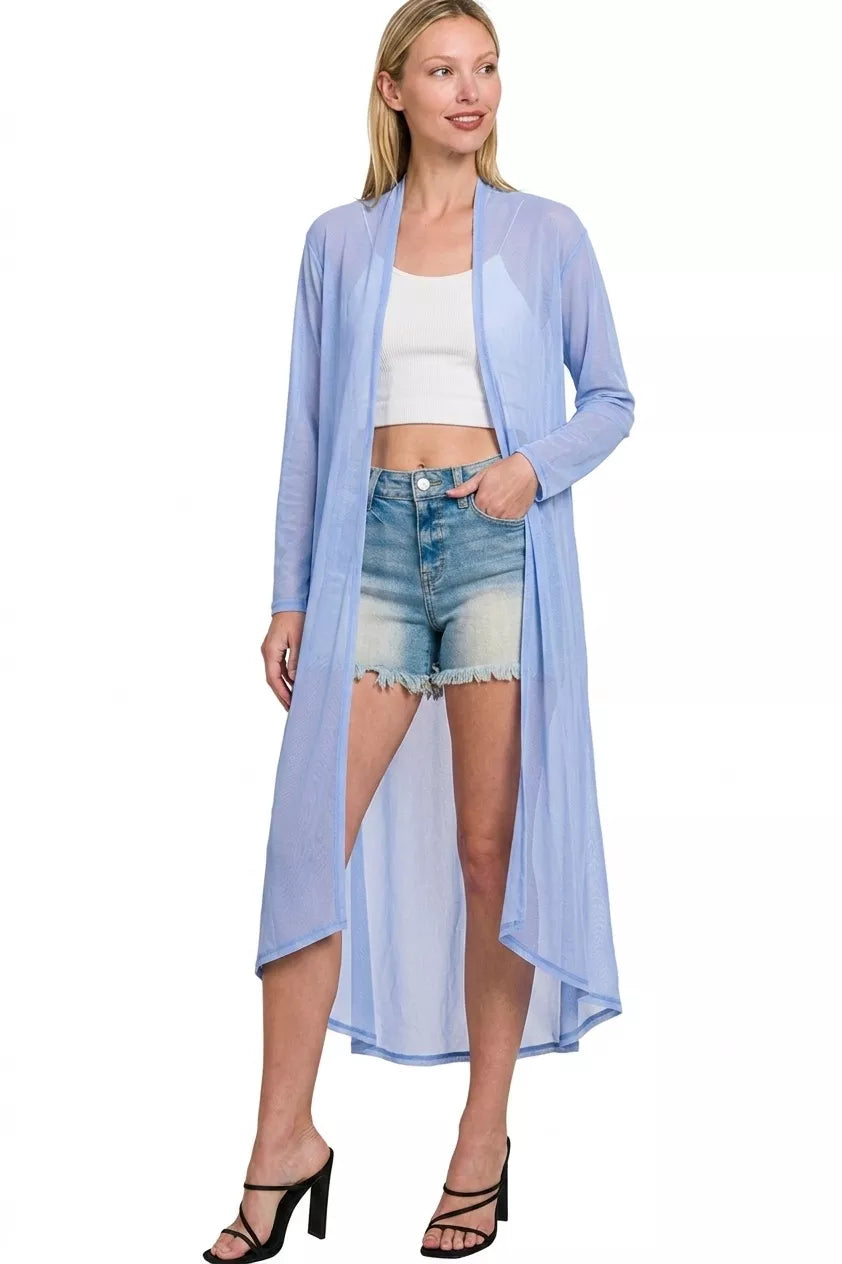 Light blue mesh open-front cardigan, asymmetrical hem over denim shorts