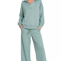 Blue grey collared pullover with cuffs and wide-leg center-seam pants set