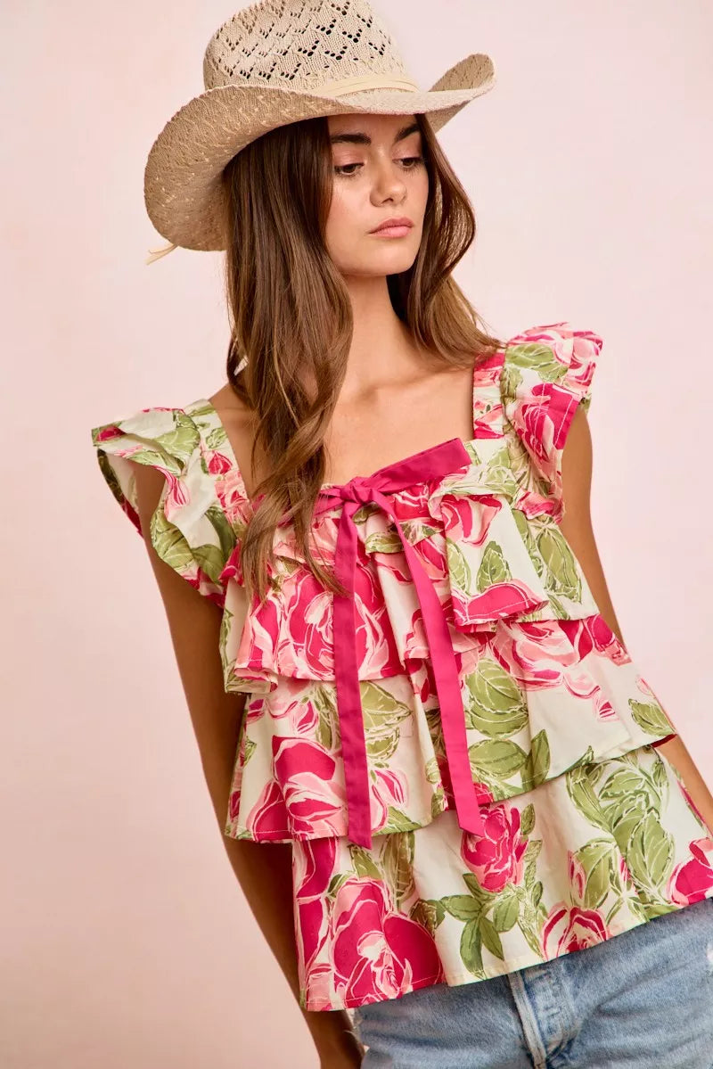 Floral ruffle square-neck top with bow tie detail, cap-sleeve ruffles and rose print