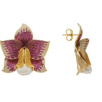 Gold-tone daffodil floral earrings with faux pearl drops and pink CZ sparkle, pair view
