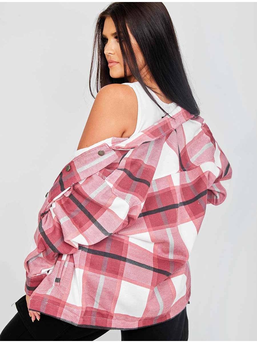 Women’s pink plaid shacket worn over shoulder with chest pocket and button front