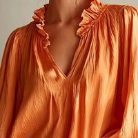 Tangerine ruffle-trim long-sleeve blouse with V-neck and frilled neckline