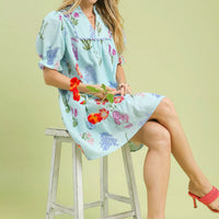 Seafoam floral print V-neck dress with puff sleeves and ruffled neckline detail