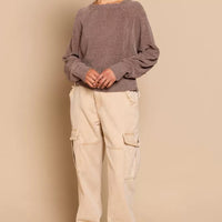 Chocolate brown backless knit sweater with round neck and ribbed cuffs, full view