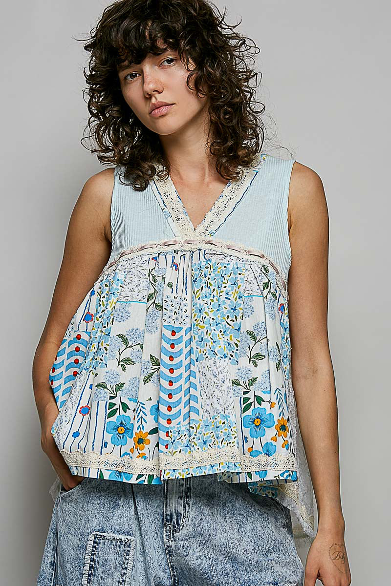 Light blue floral sheer V-neck tank with lace trim and gathered bust yoke.