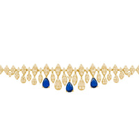 Gold tennis bracelet with sapphire teardrop drops