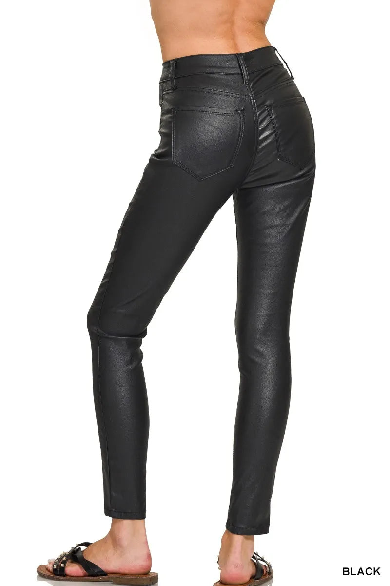 Black faux leather stretch skinny pants rear view with yoke seams and back pockets