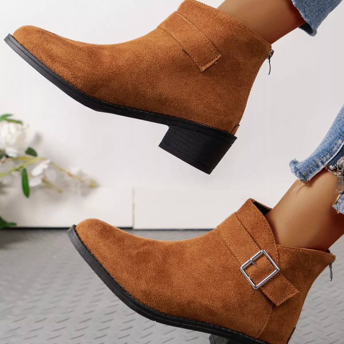 Brown suede point-toe block heel ankle boots with strap and square buckle on top