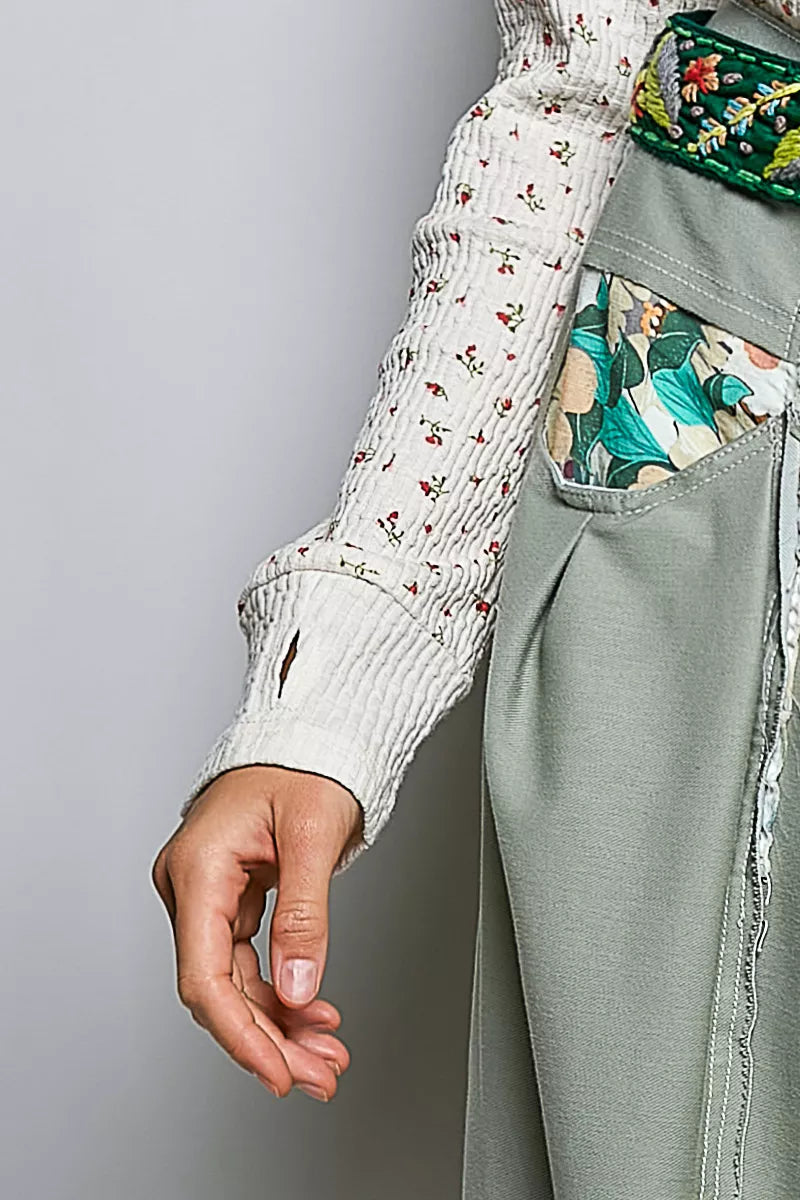 Ivory ribbed knit long sleeve top with tiny floral print and textured cuff
