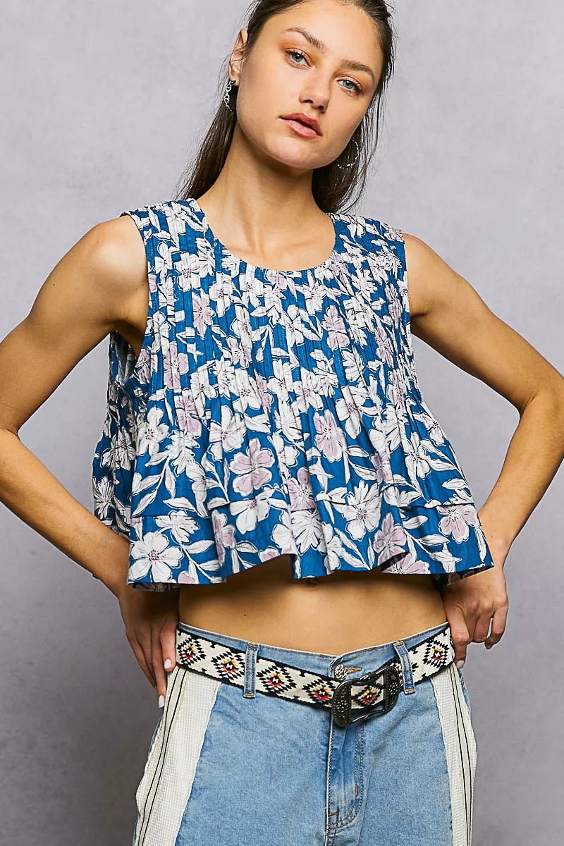 Navy floral cropped pintuck tank with round neckline and sleeveless design