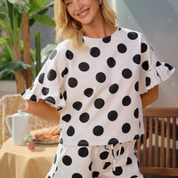 Ivory and black polka dot ruffle top with flared shorts, drawstring waist set