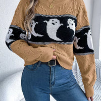 Camel ghost-pattern sweater with black-and-white yoke band and button neckline