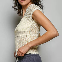 Natural lace sweetheart neck short-sleeve top, angled side view