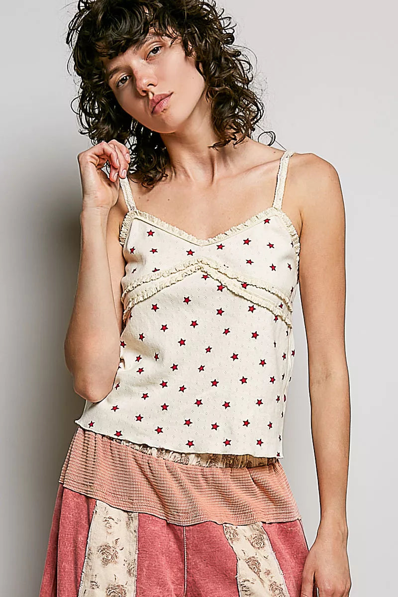 Lightweight ribbed knit cami, natural with red star print, spaghetti straps and ruffle hem