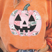 Sherbet orange tunic sweatshirt with corded ribbed knit and patchwork pumpkin graphic