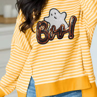 Gold and white striped long-sleeve top with sequin ghost “Boo!” graphic, split hem