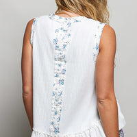 Off-white ribbed back tank with vertical floral print and ruffle hem