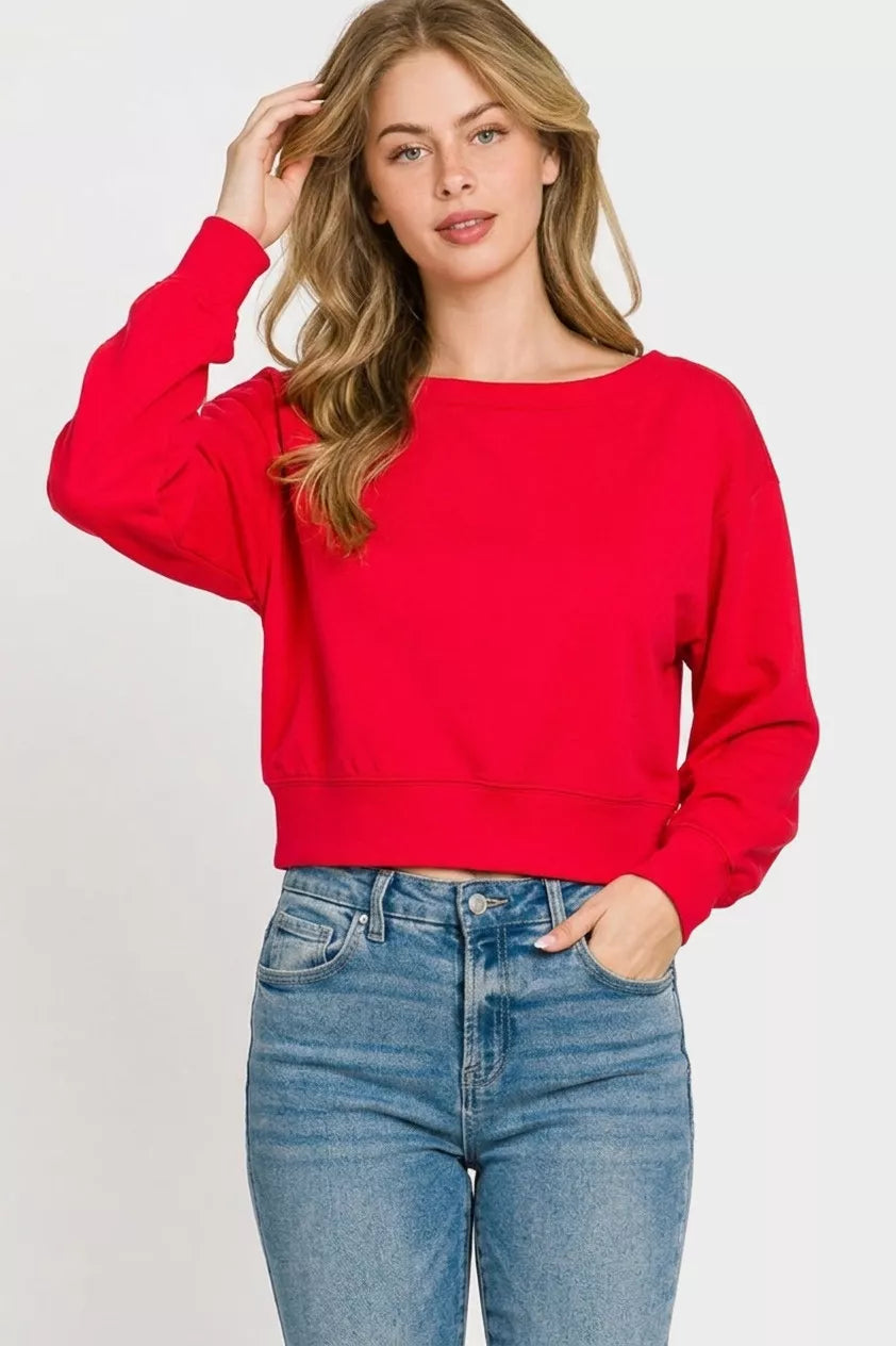 Ruby red cropped boat-neck pullover sweatshirt with long sleeves, ribbed cuffs