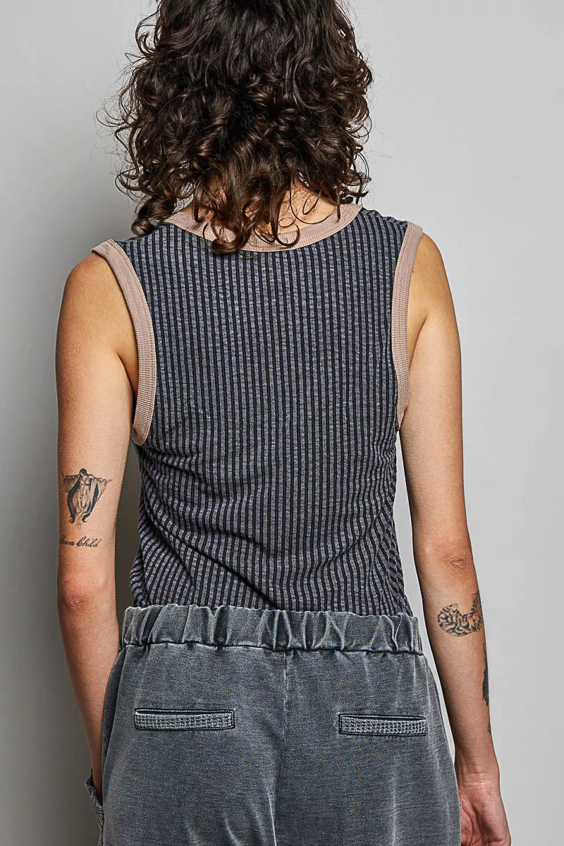 Ribbed V-neck sleeveless tank, dark charcoal, back view with gathered contrast hem